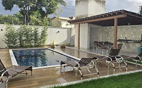 Casa Harmonia - 03 quartos sendo 01 suíte, próximo da praia, com piscina e área de churrasco